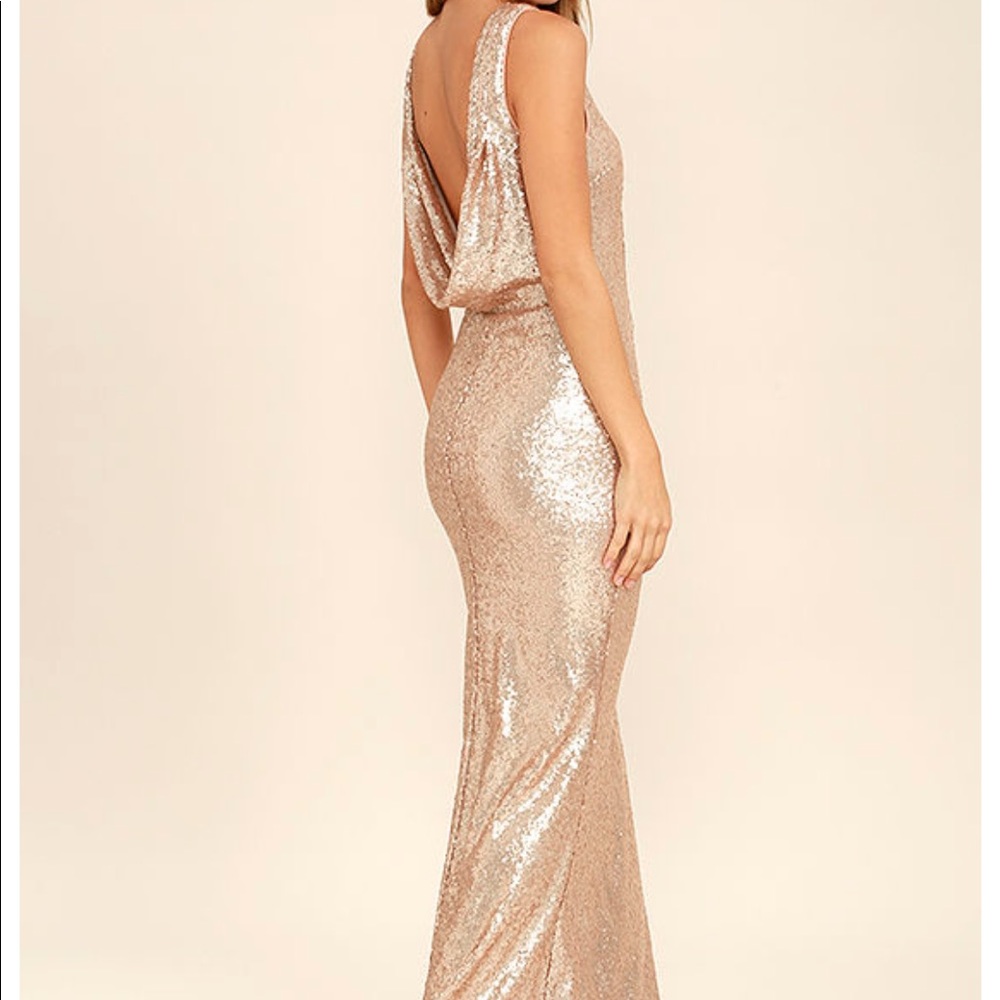 Gold sequin dress with open back.